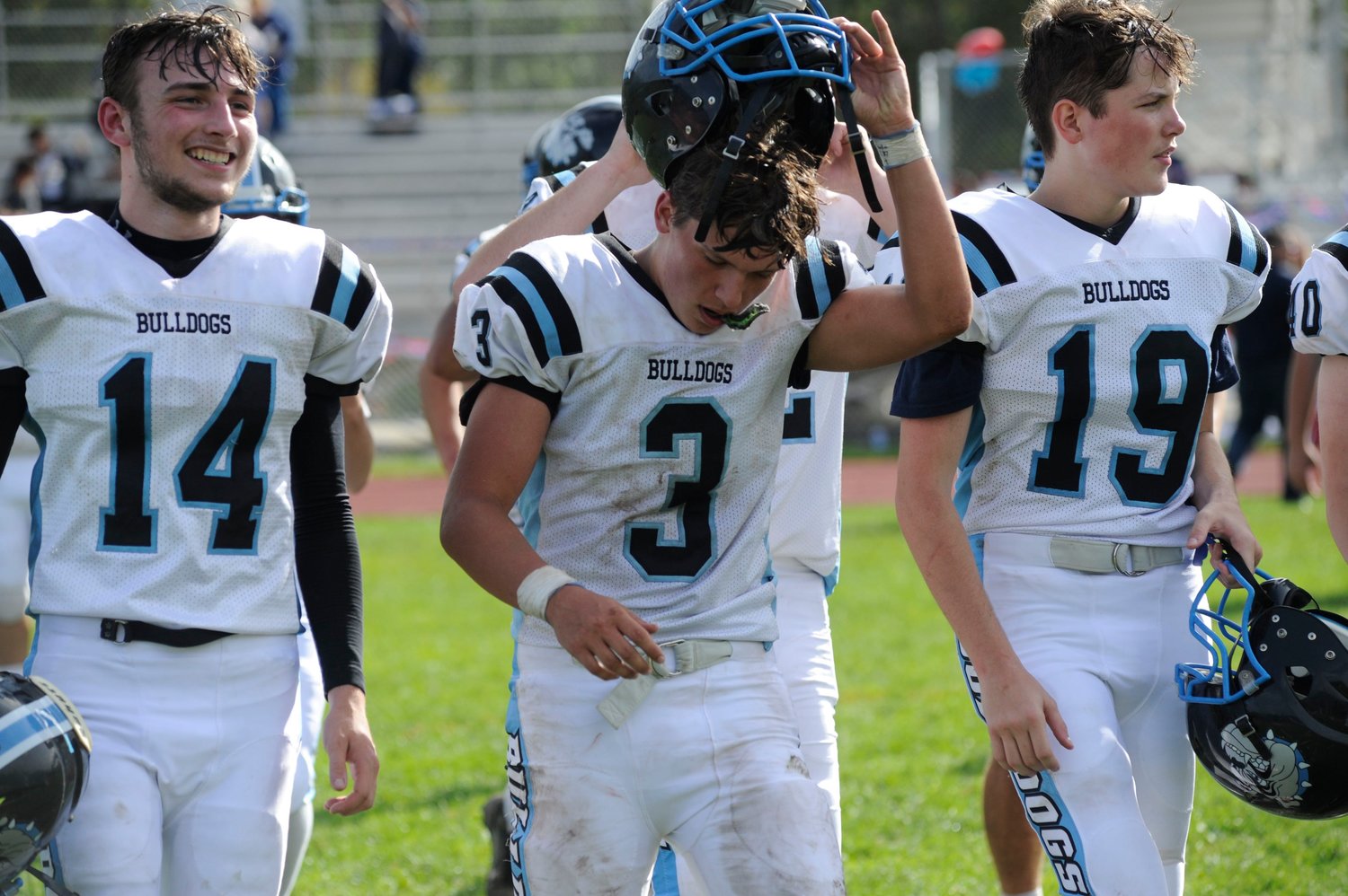 In happier times this year, Sullivan West defeated Tri-Valley 46-10 on September 25. Pictured are Mike Roth, Justin Grund and Liam Cavanaugh.